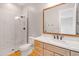 Modern bathroom featuring a frameless glass shower, marble countertop, and wood-look tile flooring at 2775 S Baker Dr, Apache Junction, AZ 85119