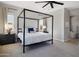 A view of the main bedroom with a decorative canopy bed and access to a soaking tub at 2775 S Baker Dr, Apache Junction, AZ 85119