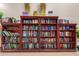 Well-stocked community library featuring a wide selection of books on dark wood shelving at 2798 W William Ln, San Tan Valley, AZ 85144