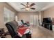 Comfortable living room with tile floors and sliding glass doors at 2798 W William Ln, San Tan Valley, AZ 85144