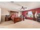 Spacious bedroom features natural light, a ceiling fan, and nice decor at 28549 N Dolomite Ln, San Tan Valley, AZ 85143