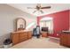 Spacious bedroom with ample closet space, neutral carpet, and a window providing great natural light at 28549 N Dolomite Ln, San Tan Valley, AZ 85143