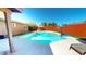 Private backyard pool with spacious patio, providing a refreshing escape and outdoor recreation at 3215 N Margate Pl, Chandler, AZ 85224