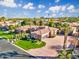 An aerial view of the property showcasing a circular driveway and detailed landscaping at 3937 E Norcroft Cir, Mesa, AZ 85215