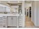 Bright bathroom featuring a marble counter and view to a walk-in closet at 3937 E Norcroft Cir, Mesa, AZ 85215