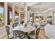 An open concept dining room offers views of the outdoor area and is adjacent to the kitchen at 3937 E Norcroft Cir, Mesa, AZ 85215