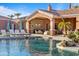 Beautiful pool with lounge chairs and patio furniture offers a relaxing outdoor space for entertaining and enjoying sunny days at 3937 E Norcroft Cir, Mesa, AZ 85215