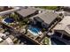 Aerial view of a private pool and landscaped backyard of a single Gathering home at 40830 W Bedford Dr, Maricopa, AZ 85138