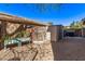 Spacious backyard features a secure fence, storage shed, and space to play at 4171 E Dublin Ct, Gilbert, AZ 85295