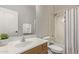 Cozy bathroom with a sink, toilet, shower, and natural light at 4171 E Dublin Ct, Gilbert, AZ 85295