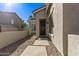 A close up of the front door, with desert landscaping, and a well maintained walkway at 4171 E Dublin Ct, Gilbert, AZ 85295