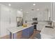 Modern kitchen featuring white cabinetry, stainless steel appliances, and a center island at 4171 E Dublin Ct, Gilbert, AZ 85295