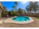 Private backyard retreat showcasing a sparkling pool, lounging area, and desert landscaping at 4171 E Dublin Ct, Gilbert, AZ 85295