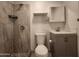 Bathroom with updated shower, tile, vanity, and toilet at 4508 E Alta Vista Rd, Phoenix, AZ 85042