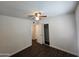 Bedroom with wood floors, closet with sliding doors, and an open doorway to another room at 4508 E Alta Vista Rd, Phoenix, AZ 85042