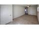 View of bedroom featuring tile flooring, ceiling fan, closet, and neutral walls at 4508 E Alta Vista Rd, Phoenix, AZ 85042