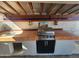 Outdoor kitchen with a grill, sink, and counter space at 4508 E Alta Vista Rd, Phoenix, AZ 85042