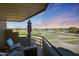 Balcony with outdoor seating offering a great view of the lush golf course at 4850 E Desert Cove Ave # 333, Scottsdale, AZ 85254