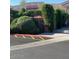 Exterior view of the O.H.S.O. Brewery building behind lush greenery at 4850 E Desert Cove Ave # 333, Scottsdale, AZ 85254