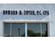 Exterior view of the Howard A. Zipser, P.C. CPA office storefront with signage at 4850 E Desert Cove Ave # 333, Scottsdale, AZ 85254