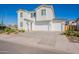 Charming two-story home with a three car garage and easy to maintain desert landscaping at 5038 W Cheryl Dr, Glendale, AZ 85302