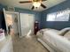 Bedroom with a single bed, tiled floors, and white closet door at 5205 N 8Th Pl, Phoenix, AZ 85014