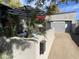 Stylish exterior of a home, complemented by lush greenery and unique architectural details at 5205 N 8Th Pl, Phoenix, AZ 85014