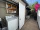 Convenient outdoor laundry area with modern appliances and storage, blending functionality with outdoor accessibility at 5205 N 8Th Pl, Phoenix, AZ 85014