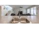 Close-up of the kitchen sink overlooking a living room with a cozy seating area at 523 S 201St Ave, Buckeye, AZ 85326