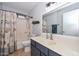 Bathroom featuring a vanity, mirror, and shower with curtain at 5726 W Mercury Way, Chandler, AZ 85226