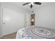 Bedroom featuring a large closet with a door, and a patterned bedspread at 5726 W Mercury Way, Chandler, AZ 85226