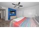 Bedroom with closet, tv, dresser, and colorful bedspread at 5726 W Mercury Way, Chandler, AZ 85226