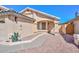 Inviting single-story home with desert landscaping, pathway to front door, and attached garage at 5726 W Mercury Way, Chandler, AZ 85226