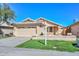 Beautiful single-story home featuring a well-kept lawn, two-car garage, and tiled roof at 5726 W Mercury Way, Chandler, AZ 85226