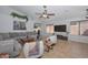 Bright and airy living room featuring tile floors, a sectional sofa, stylish seating, and decor at 5726 W Mercury Way, Chandler, AZ 85226