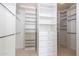 Bright walk-in closet with shelving and drawers at 6105 W Kimberly Way, Glendale, AZ 85308