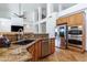 Kitchen featuring granite countertops, stainless steel appliances, and an island with seating at 6105 W Kimberly Way, Glendale, AZ 85308