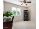 Bright bedroom with a large window and a neutral color palette at 6713 E Elmwood St, Mesa, AZ 85205