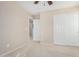 Bedroom featuring a closet, and views to other rooms at 6713 E Elmwood St, Mesa, AZ 85205