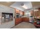 Rustic kitchen featuring stainless steel appliances, and wood cabinets at 7102 E Larkspur Dr, Scottsdale, AZ 85254