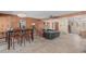 Open-concept living room with hardwood accents, a dining table, and comfortable seating at 7102 E Larkspur Dr, Scottsdale, AZ 85254