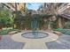 Outdoor courtyard with a modern art installation, benches, and landscaped surroundings for residents to enjoy at 7157 E Rancho Vista Dr # 2012, Scottsdale, AZ 85251