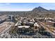 A modern condominium building with an extraordinary design that blends beautifully with lush surrounding vegetation and mature trees at 7157 E Rancho Vista Dr # 2012, Scottsdale, AZ 85251