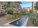 Serene water feature with fountains, surrounded by lush greenery and landscaping at 7157 E Rancho Vista Dr # 2012, Scottsdale, AZ 85251