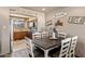 Cozy dining area with a view of the kitchen, and a dining table with 6 chairs at 7644 E Mariposa Dr, Scottsdale, AZ 85251