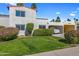 Two-story home featuring beautiful landscaping and an attached garage at 7644 E Mariposa Dr, Scottsdale, AZ 85251