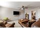 Comfortable living room showing furniture and access to the bathroom at 7644 E Mariposa Dr, Scottsdale, AZ 85251