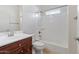 Bathroom featuring single sink vanity, combined shower and tub, and neutral palette at 7726 E Baseline Rd # 110, Mesa, AZ 85209