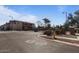 Exterior view of the community entrance with landscaping and well-maintained streets at 7726 E Baseline Rd # 110, Mesa, AZ 85209