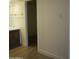 Bathroom with marble countertops and wood-look floors at 7950 E Starlight Way # 128, Scottsdale, AZ 85250